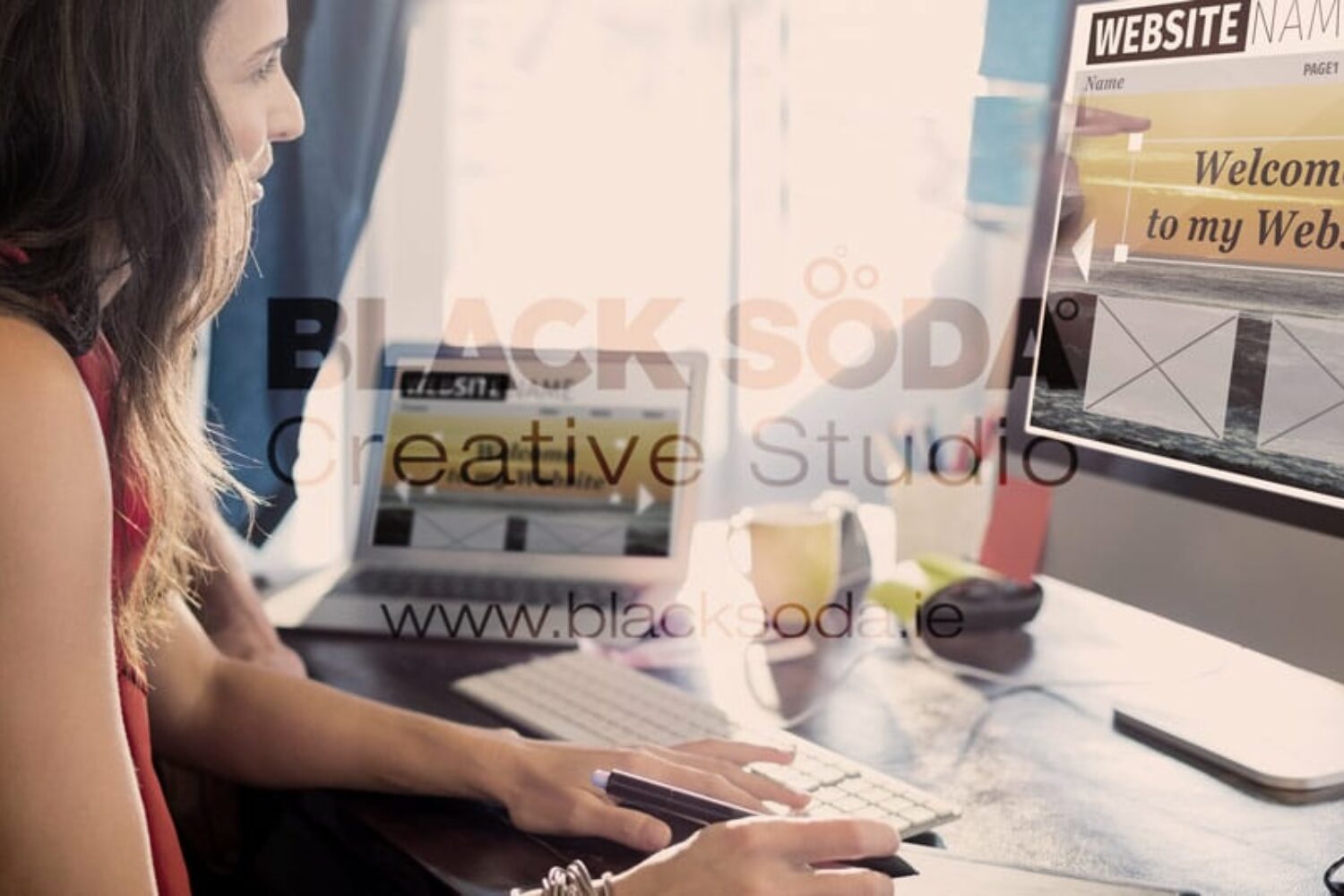 girl in the Black Soda office in Wexford working on the website design
